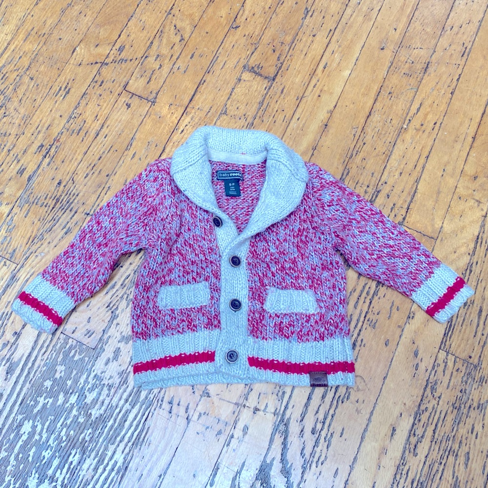 Baby Roots sweet little sweater.  Good used condition with some piling.
